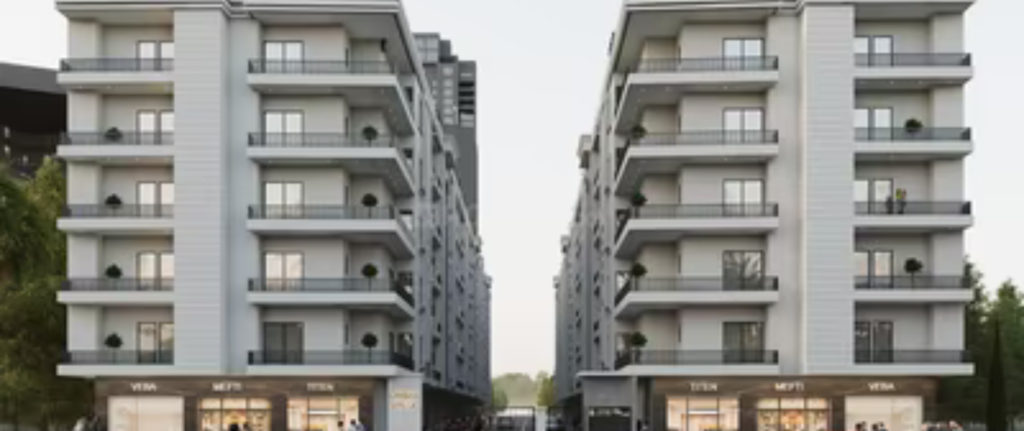 Low-rise modern 2 BHK residential building in Noida Extension by AMBR HOMES for working professionals